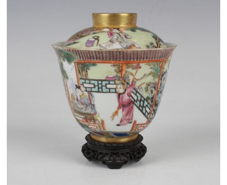 A Chinese famille rose porcelain bowl and cover, mark of Qianlong but probably later Qing dynasty, painted with figures in a 