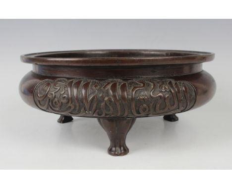 A Chinese brown patinated bronze tripod censer, made for the Islamic market, mark of Zhengde but possibly later, of squat cir