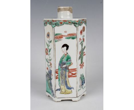 A Chinese famille verte porcelain tea caddy, Kangxi period, of hexagonal form, painted with alternating vertical panels of la