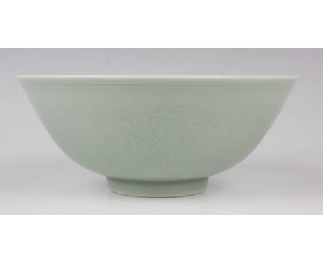 A Chinese celadon glazed porcelain bowl, mark of Qianlong but probably 20th century, of steep-sided circular form, the exteri