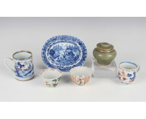 A small group of Chinese pottery, including an Imari mug, Kangxi period, painted with a coastal landscape, height 8cm, a fami