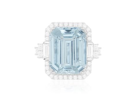 AN AQUAMARINE AND DIAMOND DRESS RINGThe cut-cornered step-cut aquamarine weighing approximately 11.70cts within a surround of