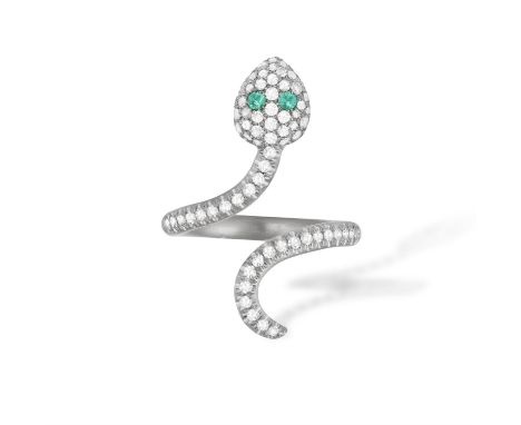 A DIAMOND AND EMERALD SNAKE RING, BY MARGHERITA BURGENERModelled as a coiled serpent pavé-set with single-cut diamonds and ci