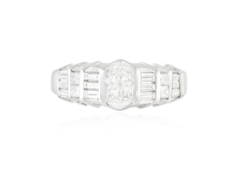 A DIAMOND DRESS RINGThe central princess-cut diamond within a surround of triangle, tapered baguette, baguette and princess-c