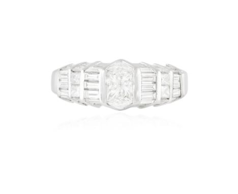 A DIAMOND DRESS RINGThe central princess-cut diamond within a surround of triangle, tapered baguette, baguette and princess-c