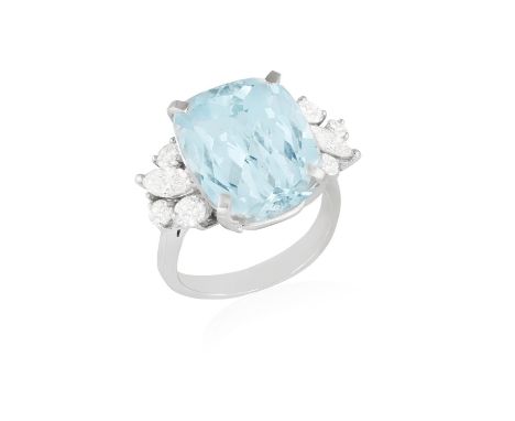 AN AQUAMARINE AND DIAMOND DRESS RINGComposed of a central cushion-shaped aquamarine weighing approximately 10.00cts between b