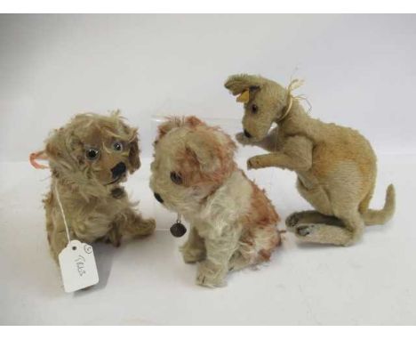 Three Steiff animals, comprising two dogs, both seated with bells and approx. 6" tall, and a Kangeroo, 11 1/2" long (Est. plu