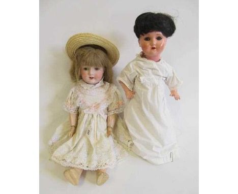 Two German bisque socket head dolls, comprising a 21 1/2" Heubach Koppelsdorf 302 4 with fixed brown eyes, open mouth and joi