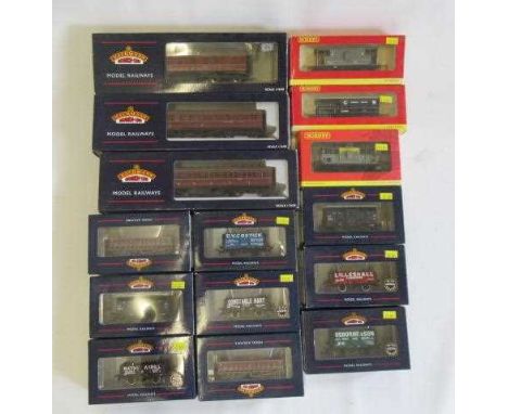 Goods and passenger rolling stock by Bachmann and Hornby including three B.R. coaches, P.O. wagons, G.W. wagons and brake van