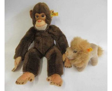 Steiff Jocko monkey, with ear tag and button, 15 1/2" long, together with a Steiff Leo lion (2) (Est. plus 24% premium inc. V