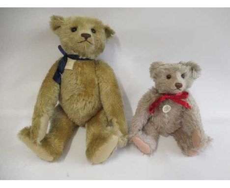 Two Steiff teddy bears, comprising a 22 1/2" 1907 replica bear, with ear button, tag and a card label, and a 15" Teddy Rose b