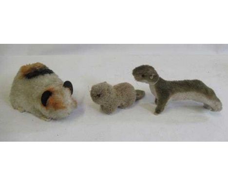 Three Steiff items, comprising a 9cm Swinny with paper tag, a Paddy with brass button to tail and a brown weasel (Est. plus 2