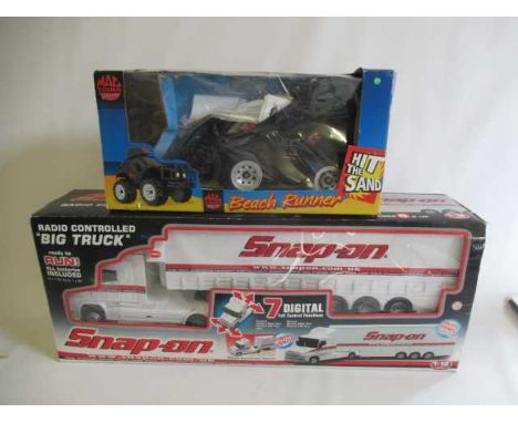 A Snap-On 1:18 scale radio controlled "Big Truck" and MAC Tools radio controlled Beach Runner, both items boxed, G-E (Est. pl