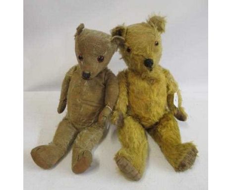 Two teddy bears, comprising a 20" 1950s Pedigree bear, with remnants of label to the back and felt pads, and a 20" pre-war be