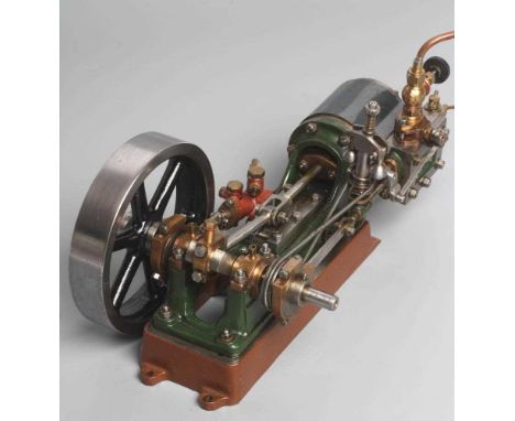 A Stuart No.9 horizontal engine with working regulator, water pump and lubricator, a well made model in good condition (Est. 