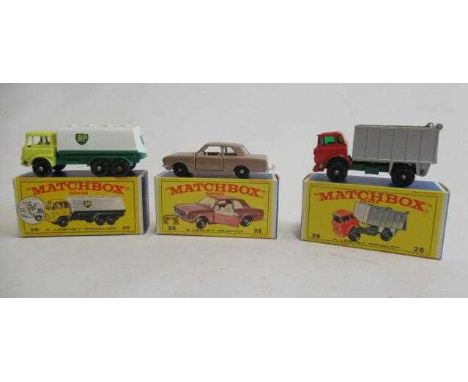 Matchbox 25c Bedford Petrol Tanker, box M, model M, 25d Ford Cortina MKII, box M, model M, and 26c G,M.C. Tipper, box M, mode
