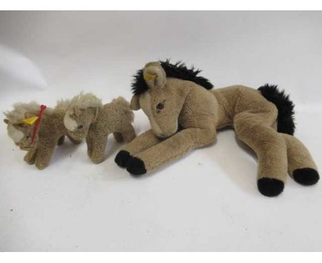 Large Steiff foal, with ear tag and button, 17 1/2" overall, together with two small Steiff Stompy horses, with felt ears and