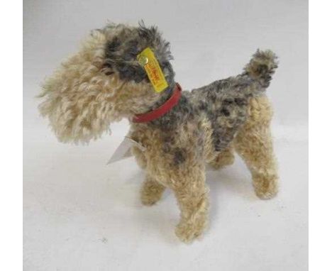 Steiff Classic 1935 Fellow Terrier in blonde and black mohair, with red collar, label and ear button, 15 1/2" overall (Est. p