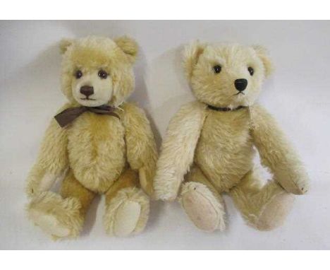 Two Steiff bears, both with light plush, felt pads and brass ear buttons, both approx. 16 3/4" long (Est. plus 24% premium in