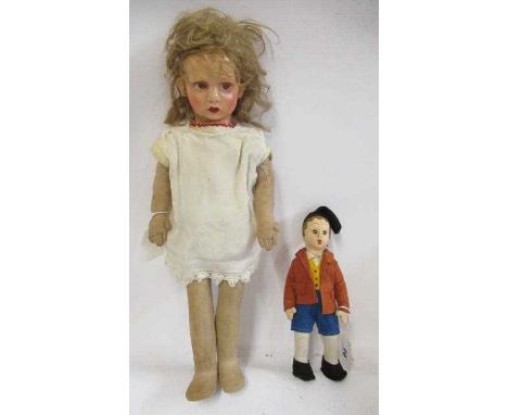 Two cloth dolls, comprising an 8 1/2" Lenci boy doll in original outfit, together with a 17 1/2" Lenci style doll, with sidew