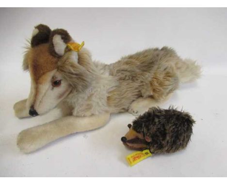 Steiff Corso collie dog, with amber eyes, ear button and label, 16 1/2" long, together with a Steiff Joggi hedgehog, with but
