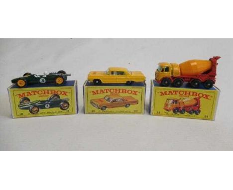 Matchbox 19d Lotus race car, box M, model M, 20c Chevrolet Impala Taxi, box M, model M, and 21d Foden Concrete Mixer, box M, 