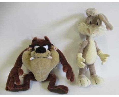 Two Steiff plush toys, comprising a 26cm Bugs Bunny with ear button, label and card tag, and a 25cm Tasmanian Devil "Taz" wit