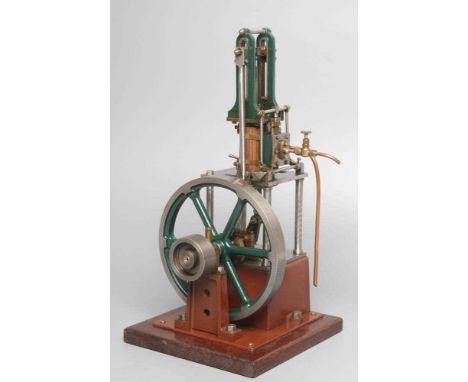 A Stuart turner Models James Combe four pillar table engine, a well made and interesting model on wood base, 8" x 8" x 15" wi