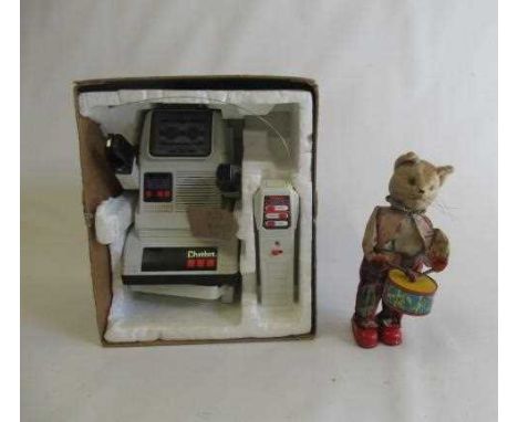 A clockwork drumming/walking cat, (clockwork motor ok) and a battery operated TOMY robot, F (Est. plus 24% premium inc. VAT)