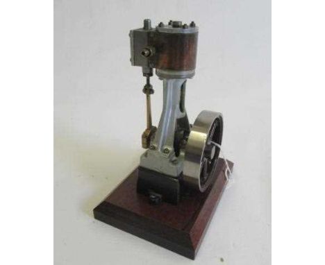 A Stuart Models H10 steam engine single cylinder non-reversing vertical steam engine, a well made model on wooden base, 5 1/2
