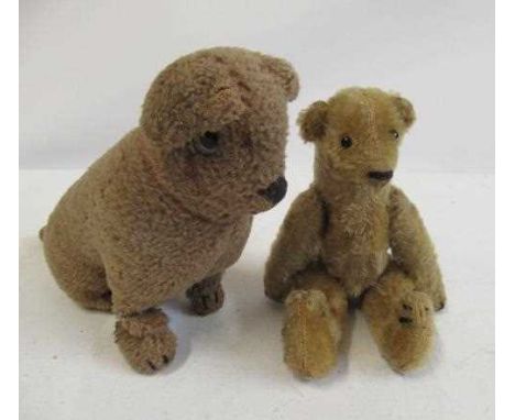 Two vintage plush toys, comprising an 8 1/4" five piece straw filled teddy bear with shoe button eyes, and an 8 1/4" sitting 