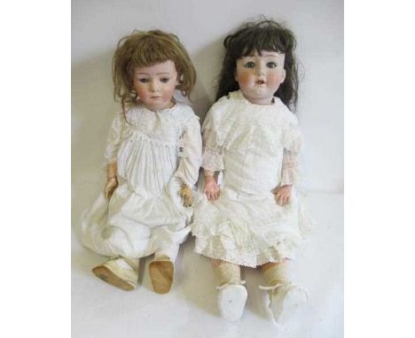 Two restored Gebruder Heubach bisque socket head dolls, comprising one 28" 8192 and one 23" 7248, both with blue glass sleepi