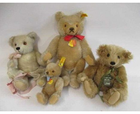 Four Steiff teddy bears, comprising a 12" Original, a 10" musical bear with Harrods label, 11 1/4" white Ophelia bear, and a 