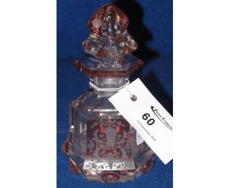 A ruby flash decorated hexagonal form baluster scent bottle with pointed finial and engraved foliate decoration overall.