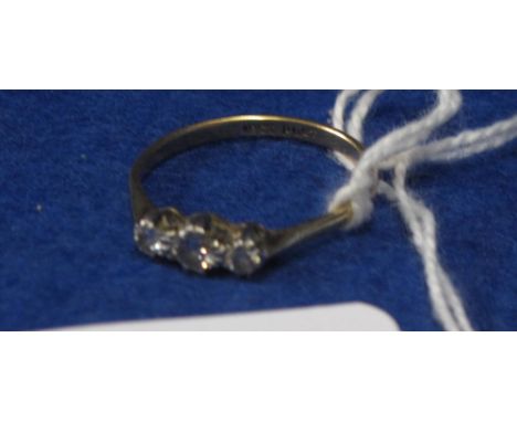 18ct gold and platinum three stone diamond ring.