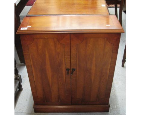 Reproduction yew wood free standing DVD cabinet. CONDITION REPORT: Good overall condition, light wear in places.  24½" wide, 