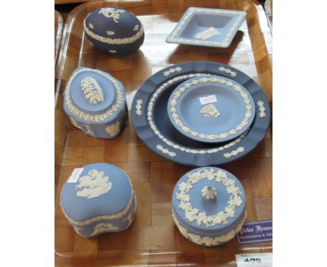 Tray of assorted blue and white Wedgwood Jasper ware items to include trinket boxes and pin dishes.  (7)