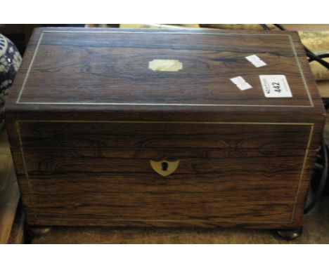 19th Century rosewood rectangular tea caddy on bun feet.
