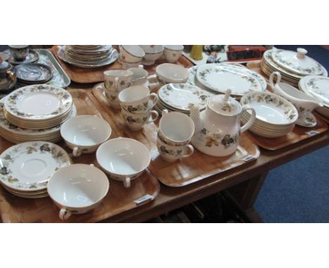 Four trays of Royal Doulton Fine Bone China Larchmont part tea and dinner ware items comprising tea cups and saucers, tea pot