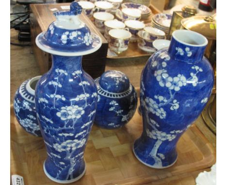 Tray of Chinese porcelain blue and white prunus blossom items to include baluster vases and ginger jars.  (5) CONDITION REPOR