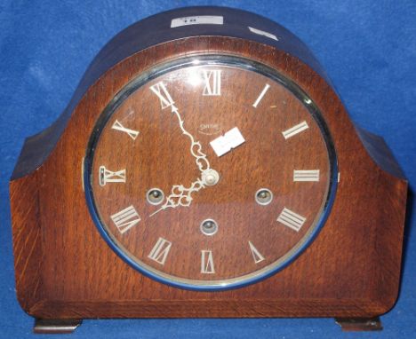 Mid 20th Century oak cased Smiths arched three train mantle clock.
