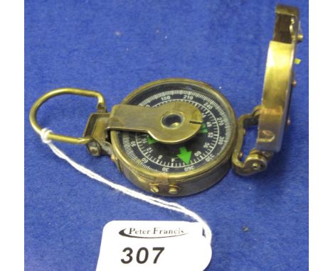 Ross of London brass folding travel compass with anchor decoration.