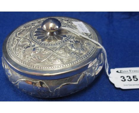 White metal animal and floral engraved circular jar and cover, possibly Indian.