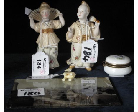 Two porcelain continental nodding head figures, small elephant group, crystal monochrome image under glass and patch box.  (5