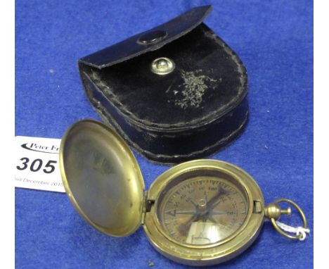 Brass pocket compass marked: T. Cooke, London, in leather pouch.