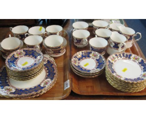 Two trays of Royal Stafford bone china Empress blue tea ware items comprising cups, saucers, milk jug, sucriers, plates etc. 