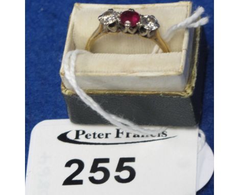 18ct gold diamond and rugby three stone ring in box.