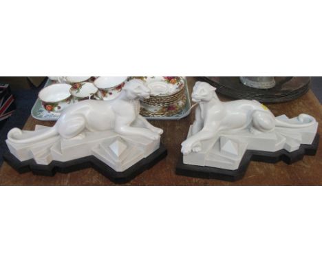 After Trudeau, pair of art deco design studies of recumbent panthers on geometric step bases.  (2)