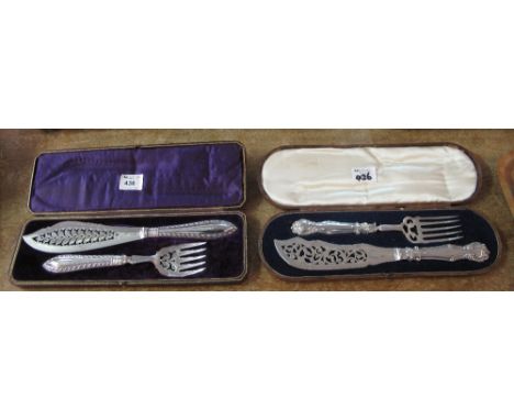 Two early 20th Century similar cased, pierced and foliate, silver plated cake knife and fork set. (2)