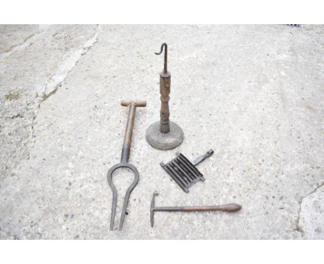 A 19th century turned wood and iron hook stand, on circular base, a no.2 size tap hammer with turned wooden handle, a two pro